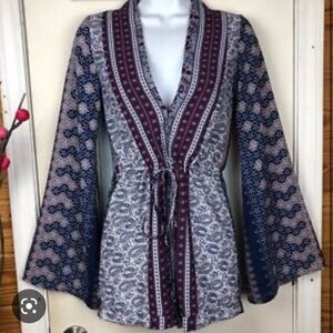 Olivaceous boho bell sleeve deep v paisley romper